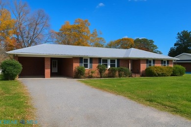 Welcome to Tee & Tide, a waterfront retreat where your days on Indian Creek Yacht and Country Club in Virginia - for sale on GolfHomes.com, golf home, golf lot