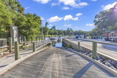 Welcome to 94 Hunter Oak Court, a beautifully maintained on The Reserve Golf Club at Pawleys Island in South Carolina - for sale on GolfHomes.com, golf home, golf lot