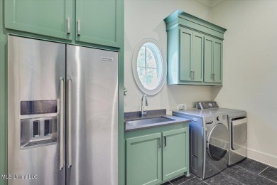 Discover resort-style living just minutes away from the on Reunion Golf Club in Mississippi - for sale on GolfHomes.com, golf home, golf lot