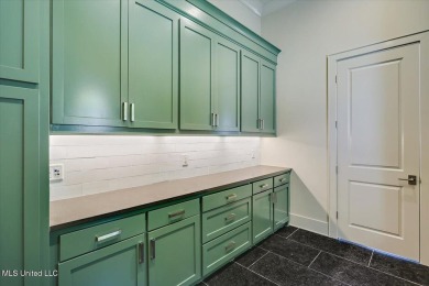 Discover resort-style living just minutes away from the on Reunion Golf Club in Mississippi - for sale on GolfHomes.com, golf home, golf lot