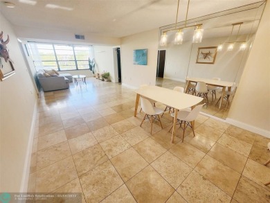 Top-Floor Luxury with Jaw-Dropping Views in Pine Island Ridge

 on Pine Island Ridge Country Club in Florida - for sale on GolfHomes.com, golf home, golf lot