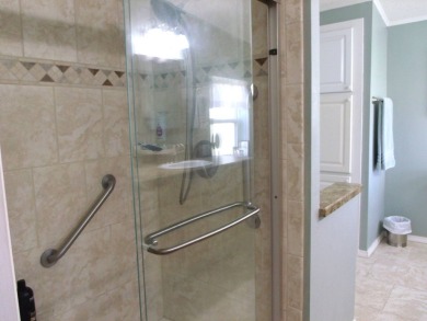 Discover this stunning 3-bedroom Palm Harbor home, offering a on Schalamar Creek Golf and Country Club in Florida - for sale on GolfHomes.com, golf home, golf lot