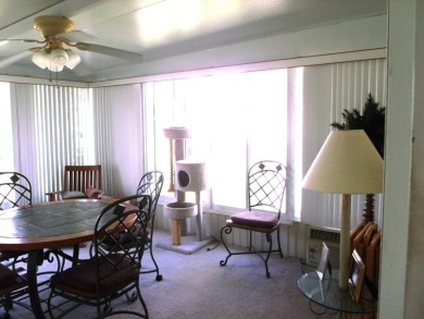 Discover this stunning 3-bedroom Palm Harbor home, offering a on Schalamar Creek Golf and Country Club in Florida - for sale on GolfHomes.com, golf home, golf lot