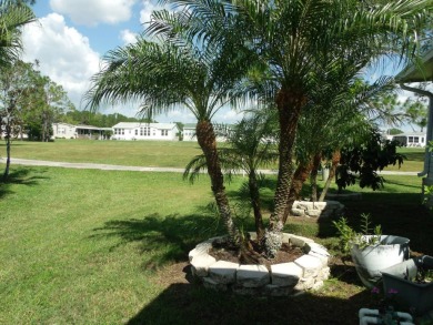 Discover this stunning 3-bedroom Palm Harbor home, offering a on Schalamar Creek Golf and Country Club in Florida - for sale on GolfHomes.com, golf home, golf lot