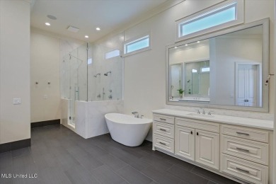 Discover resort-style living just minutes away from the on Reunion Golf Club in Mississippi - for sale on GolfHomes.com, golf home, golf lot