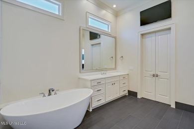 Discover resort-style living just minutes away from the on Reunion Golf Club in Mississippi - for sale on GolfHomes.com, golf home, golf lot