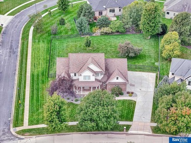 Nestled among the scenic Hi-Mark golf couse, this stunning on Pine Lake Golf and Tennis Club in Nebraska - for sale on GolfHomes.com, golf home, golf lot