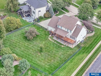 Nestled among the scenic Hi-Mark golf couse, this stunning on Pine Lake Golf and Tennis Club in Nebraska - for sale on GolfHomes.com, golf home, golf lot