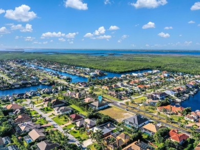 NEW PRICE! Discover this luxury residence, situated on a .29 on Royal Tee Country Club in Florida - for sale on GolfHomes.com, golf home, golf lot