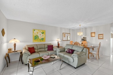 Penthouse views in this 1 BR, 1.5 BA with Den that can be used on Poinciana Golf Club in Florida - for sale on GolfHomes.com, golf home, golf lot