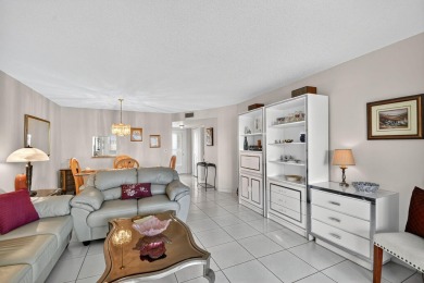 Penthouse views in this 1 BR, 1.5 BA with Den that can be used on Poinciana Golf Club in Florida - for sale on GolfHomes.com, golf home, golf lot