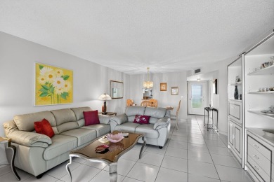 Penthouse views in this 1 BR, 1.5 BA with Den that can be used on Poinciana Golf Club in Florida - for sale on GolfHomes.com, golf home, golf lot