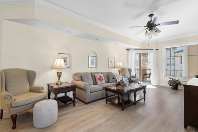 Sunlight pours into this bright, open 3-bedroom, 2-bath end-unit on Barefoot Resort and Golf Club  in South Carolina - for sale on GolfHomes.com, golf home, golf lot
