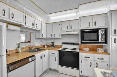 Penthouse views in this 1 BR, 1.5 BA with Den that can be used on Poinciana Golf Club in Florida - for sale on GolfHomes.com, golf home, golf lot