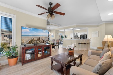 Sunlight pours into this bright, open 3-bedroom, 2-bath end-unit on Barefoot Resort and Golf Club  in South Carolina - for sale on GolfHomes.com, golf home, golf lot