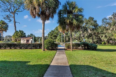 55+ COMMUNITY. GORGEOUS, TWO-BEDROOM/1.5 BATHS, SECOND-FLOOR END on Rolling Greens Executive Golf Community in Florida - for sale on GolfHomes.com, golf home, golf lot