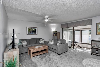 55+ COMMUNITY. GORGEOUS, TWO-BEDROOM/1.5 BATHS, SECOND-FLOOR END on Rolling Greens Executive Golf Community in Florida - for sale on GolfHomes.com, golf home, golf lot