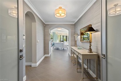 This penthouse style condo brings together a relaxed on Tiburon Golf Club in Florida - for sale on GolfHomes.com, golf home, golf lot