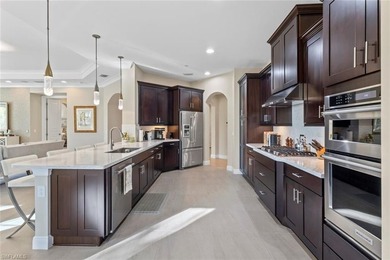 This penthouse style condo brings together a relaxed on Tiburon Golf Club in Florida - for sale on GolfHomes.com, golf home, golf lot