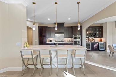 This penthouse style condo brings together a relaxed on Tiburon Golf Club in Florida - for sale on GolfHomes.com, golf home, golf lot