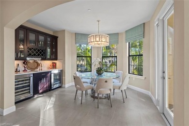 This penthouse style condo brings together a relaxed on Tiburon Golf Club in Florida - for sale on GolfHomes.com, golf home, golf lot