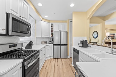 Delightful Deer Crossing 3 bedroom, 2 bath 1st floor end unit on The Rookery At Marco in Florida - for sale on GolfHomes.com, golf home, golf lot