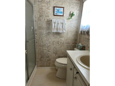 Palm Hill Country Club is a distinguished community that has on Palm Hill Golf Club in Florida - for sale on GolfHomes.com, golf home, golf lot