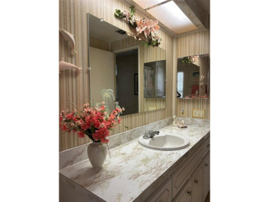 Palm Hill Country Club is a distinguished community that has on Palm Hill Golf Club in Florida - for sale on GolfHomes.com, golf home, golf lot