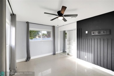 Beautifully Updated 3-Bedroom Home with Modern Upgrades in on Fort Lauderdale Country Club in Florida - for sale on GolfHomes.com, golf home, golf lot