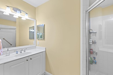 Delightful Deer Crossing 3 bedroom, 2 bath 1st floor end unit on The Rookery At Marco in Florida - for sale on GolfHomes.com, golf home, golf lot