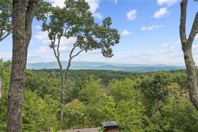 Nestled within the heart of Big Canoe's stunning mountain on Big Canoe Golf Club - Cherokee in Georgia - for sale on GolfHomes.com, golf home, golf lot