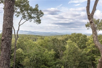 Nestled within the heart of Big Canoe's stunning mountain on Big Canoe Golf Club - Cherokee in Georgia - for sale on GolfHomes.com, golf home, golf lot