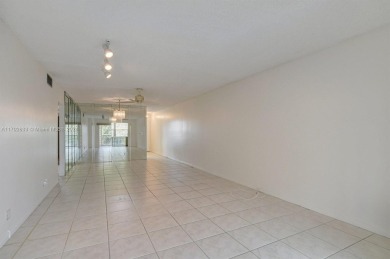 Great unit on top floor, views of garden and pool from your on Wynmoor Golf Course in Florida - for sale on GolfHomes.com, golf home, golf lot