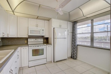 Great unit on top floor, views of garden and pool from your on Wynmoor Golf Course in Florida - for sale on GolfHomes.com, golf home, golf lot