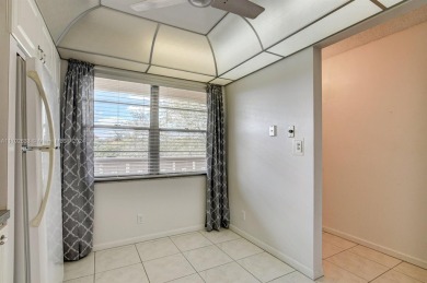 Great unit on top floor, views of garden and pool from your on Wynmoor Golf Course in Florida - for sale on GolfHomes.com, golf home, golf lot
