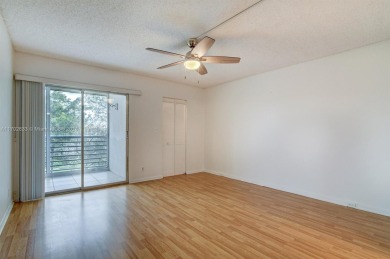 Great unit on top floor, views of garden and pool from your on Wynmoor Golf Course in Florida - for sale on GolfHomes.com, golf home, golf lot
