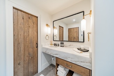 Nestled within the gated community of Highlands Falls Country on Highlands Falls Country Club in North Carolina - for sale on GolfHomes.com, golf home, golf lot