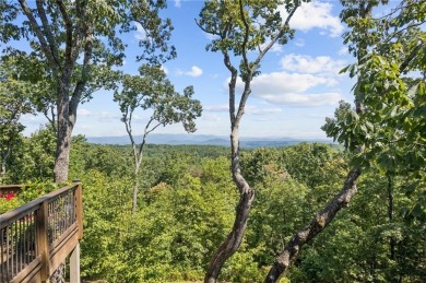 Nestled within the heart of Big Canoe's stunning mountain on Big Canoe Golf Club - Cherokee in Georgia - for sale on GolfHomes.com, golf home, golf lot