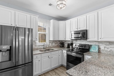 This charming 2-bedroom, 2-bath beach bungalow is one you'll on Barefoot Resort and Golf Club  in South Carolina - for sale on GolfHomes.com, golf home, golf lot