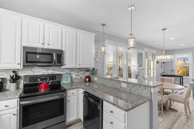 This charming 2-bedroom, 2-bath beach bungalow is one you'll on Barefoot Resort and Golf Club  in South Carolina - for sale on GolfHomes.com, golf home, golf lot