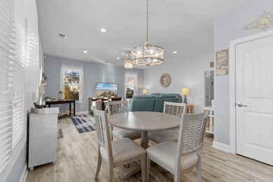 This charming 2-bedroom, 2-bath beach bungalow is one you'll on Barefoot Resort and Golf Club  in South Carolina - for sale on GolfHomes.com, golf home, golf lot