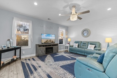 This charming 2-bedroom, 2-bath beach bungalow is one you'll on Barefoot Resort and Golf Club  in South Carolina - for sale on GolfHomes.com, golf home, golf lot