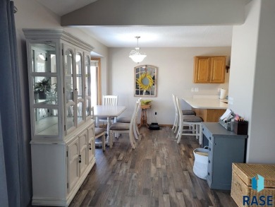 Middle unit of a Lake Golf Course (Lake Madison) ranch tri-plex on Lakes Golf Course in South Dakota - for sale on GolfHomes.com, golf home, golf lot