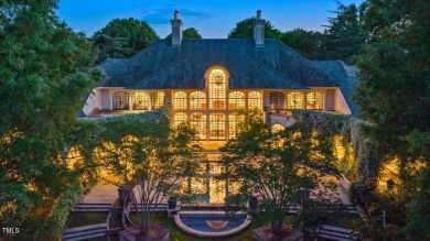 The famous Painter House! A gorgeous estate sprawling over 1.8 on North Ridge Country Club in North Carolina - for sale on GolfHomes.com, golf home, golf lot