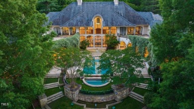 The famous Painter House! A gorgeous estate sprawling over 1.8 on North Ridge Country Club in North Carolina - for sale on GolfHomes.com, golf home, golf lot