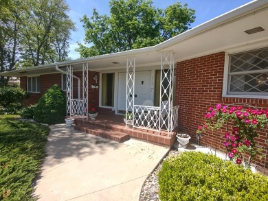 Check out this large brick ranch home with customized back patio on Russell Golf Course in Kansas - for sale on GolfHomes.com, golf home, golf lot