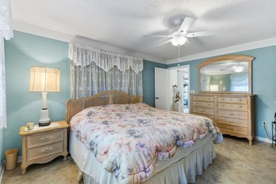 Located in the desirable  SPRUCE CREEK SOUTH adjacent to THE on The Links of Spruce Creek in Florida - for sale on GolfHomes.com, golf home, golf lot