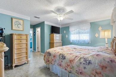 Located in the desirable  SPRUCE CREEK SOUTH adjacent to THE on The Links of Spruce Creek in Florida - for sale on GolfHomes.com, golf home, golf lot