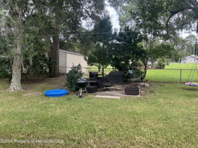 Come a see this great 3/2 Pool Home in the very desirable Citrus on Citrus Springs Country Club in Florida - for sale on GolfHomes.com, golf home, golf lot