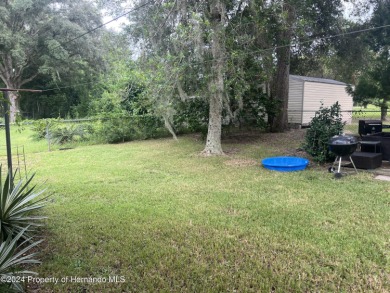 Come a see this great 3/2 Pool Home in the very desirable Citrus on Citrus Springs Country Club in Florida - for sale on GolfHomes.com, golf home, golf lot